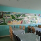 Mural representing Patchway and Charlton Hayes past, present and future on the wall at Coniston Cafe in Coniston Community Centre.